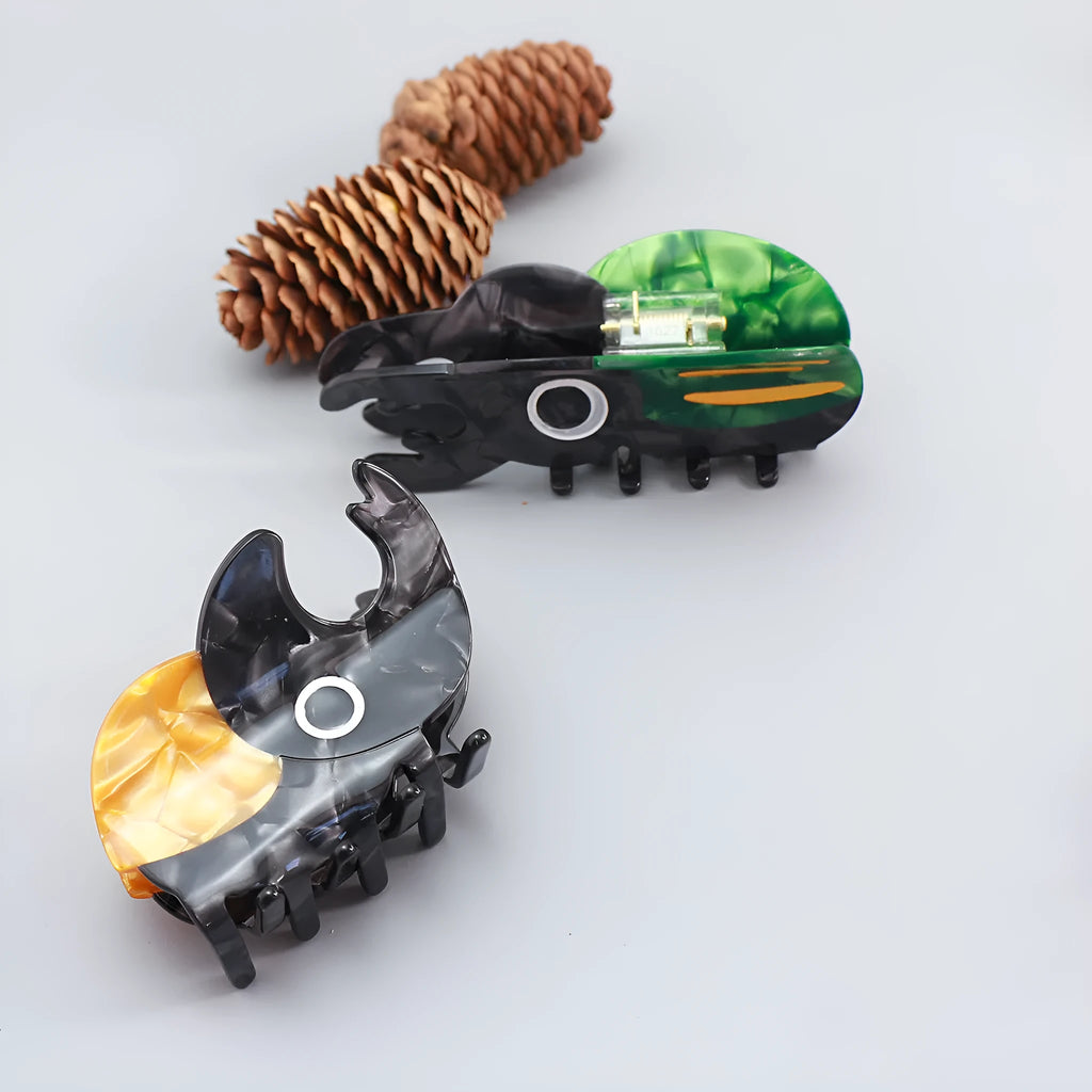 Cellulose acetate beetle grip with insect biology design in green, orange, or white colour options