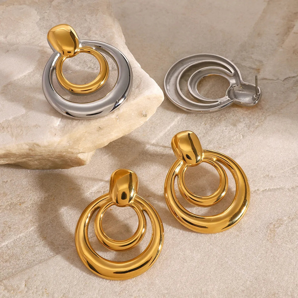 Round geometric gold-plated hollow stud earrings with double layer design on titanium steel