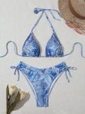 Women's denim blue printed bikini set with adjustable straps shown front and back