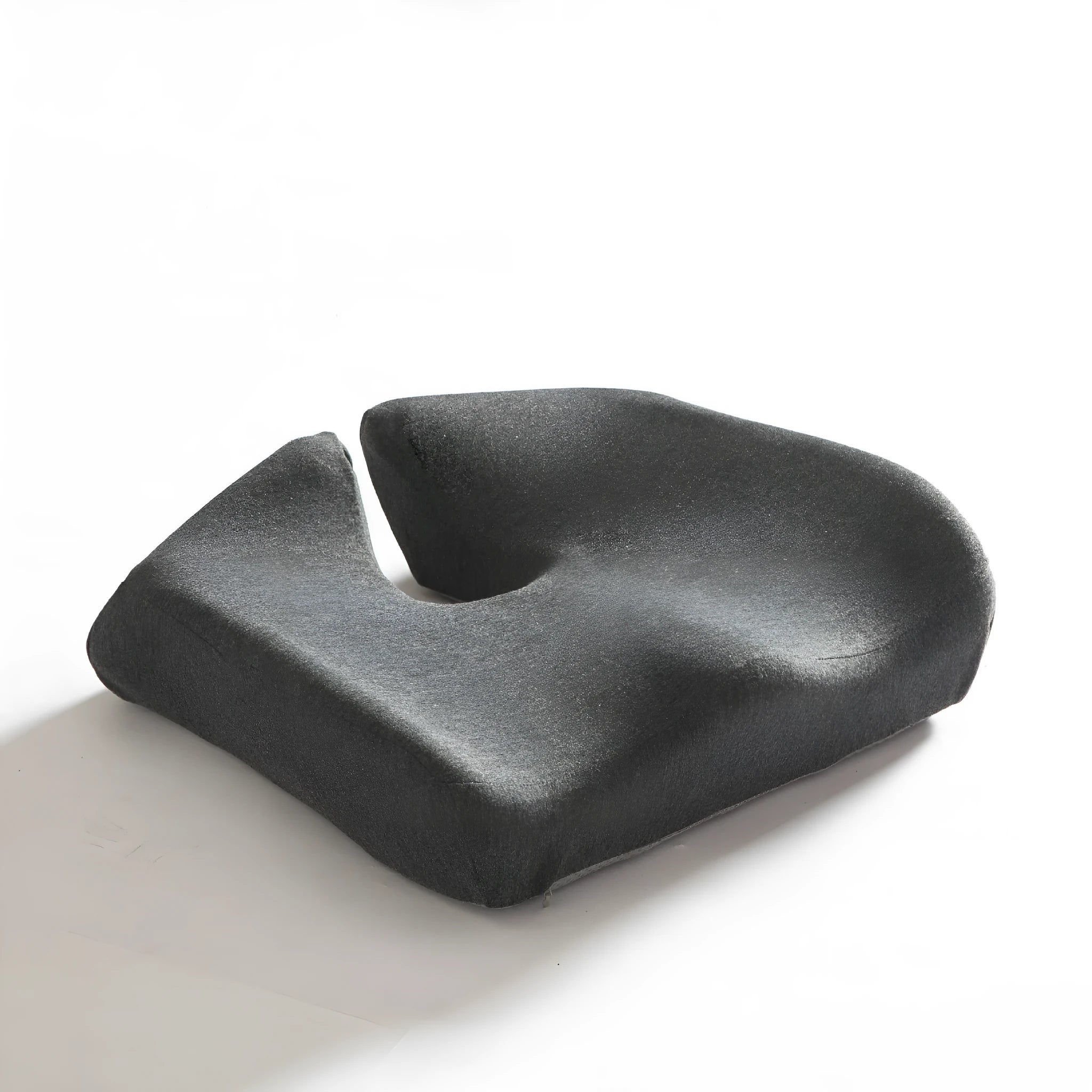 Memory foam office chair cushion for waist support in dark grey colour.