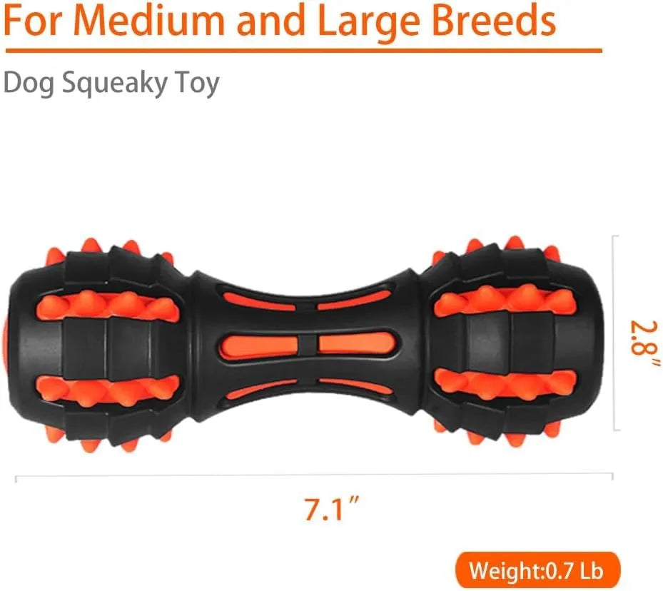 Red dumbbell-shaped durable rubber dog chew toy for aggressive chewers on a plain background.