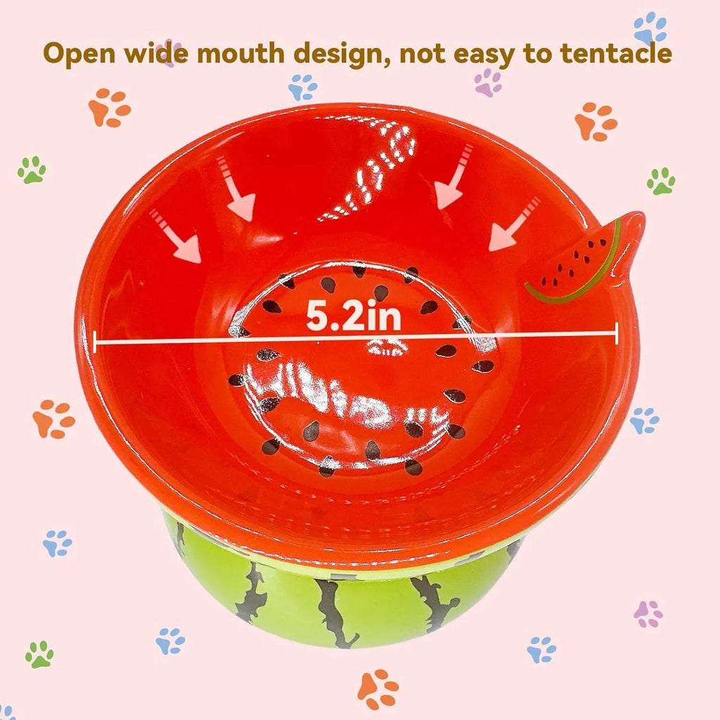 Orange ceramic raised cat bowl with tilted design and non-slip base on a table.
