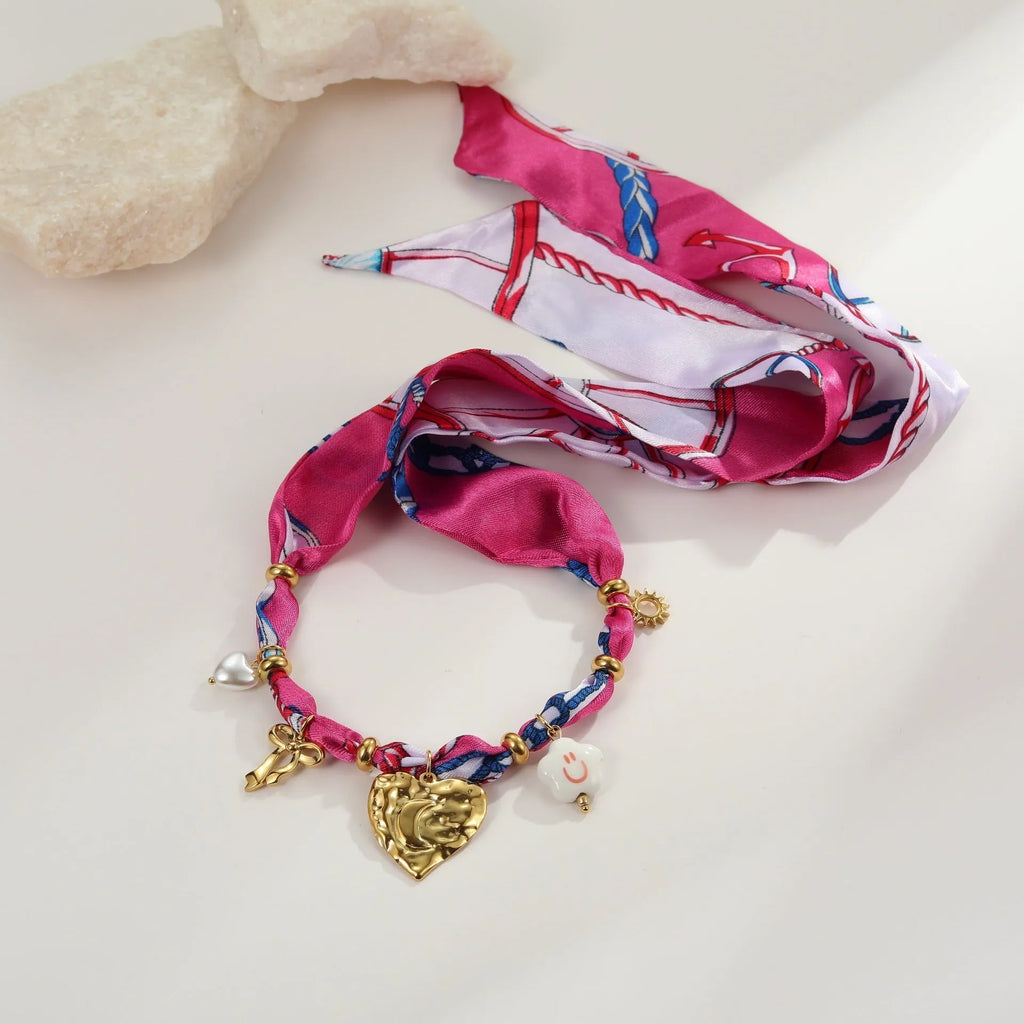 Geometric chain necklace and bracelet jewellery set in stainless steel with gold electroplated finish