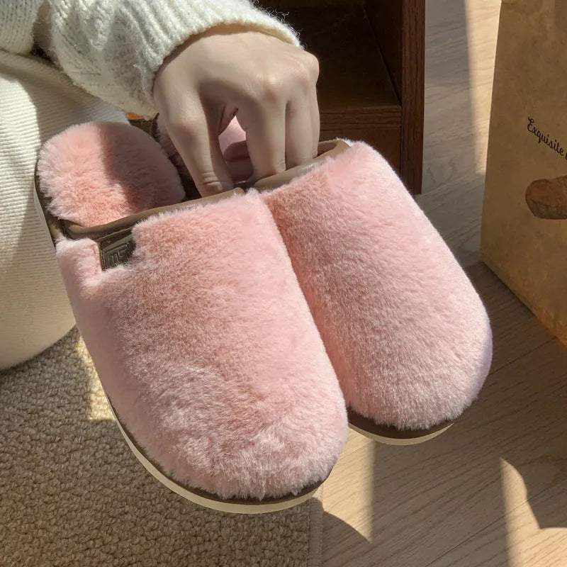 Solid colour winter plush slippers with decorative car stitching and non-slip PVC sole
