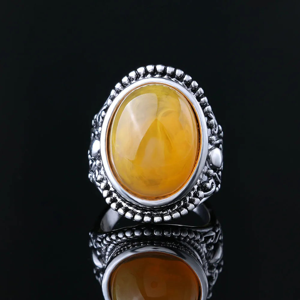 Geometric retro alloy ring with fluorescent beeswax centrepiece in antique silver Amber colour