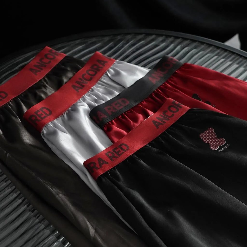 Solid colour men's polyester boxer briefs in six colours with mid-waist design