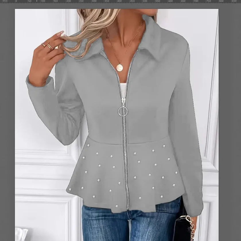 Women's solid colour coat with beaded zipper and ruffled hem detail