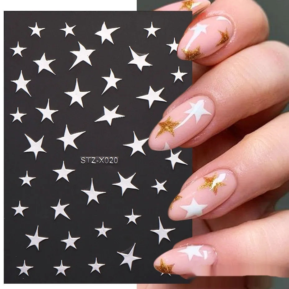 Set of 60 black and silver cartoon pattern nail strip stickers with plastic application patch.