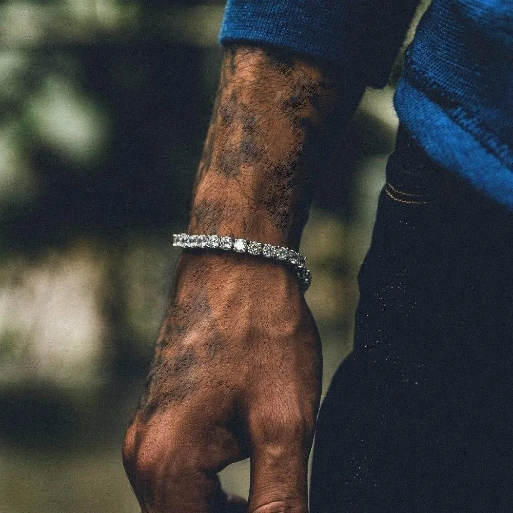 Men's geometric chain bracelet with iced out zirconia rhinestones in five metallic colour options.