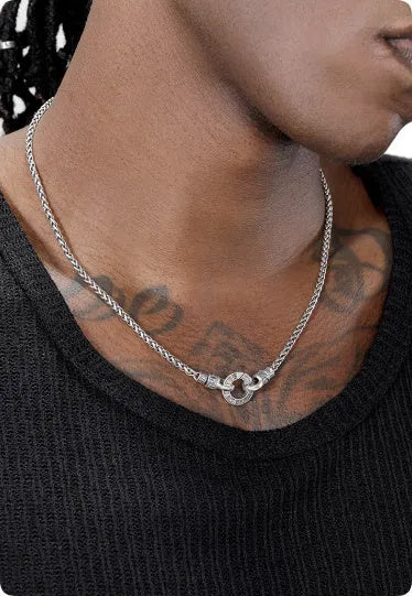 Sterling silver clavicle necklace for women with solid pendant on a delicate chain.