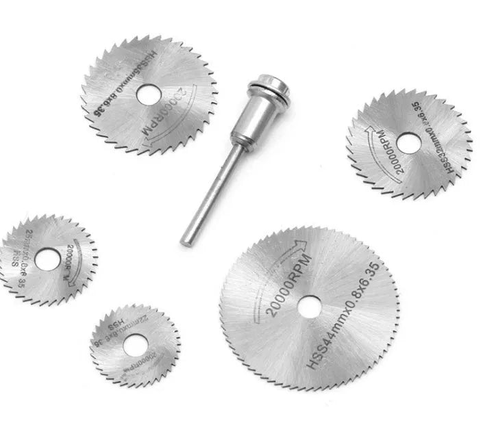 Six high-speed steel circular saw blades and a mandrel on a white background