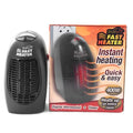 Small black portable ceramic electric heater with digital display on a white background