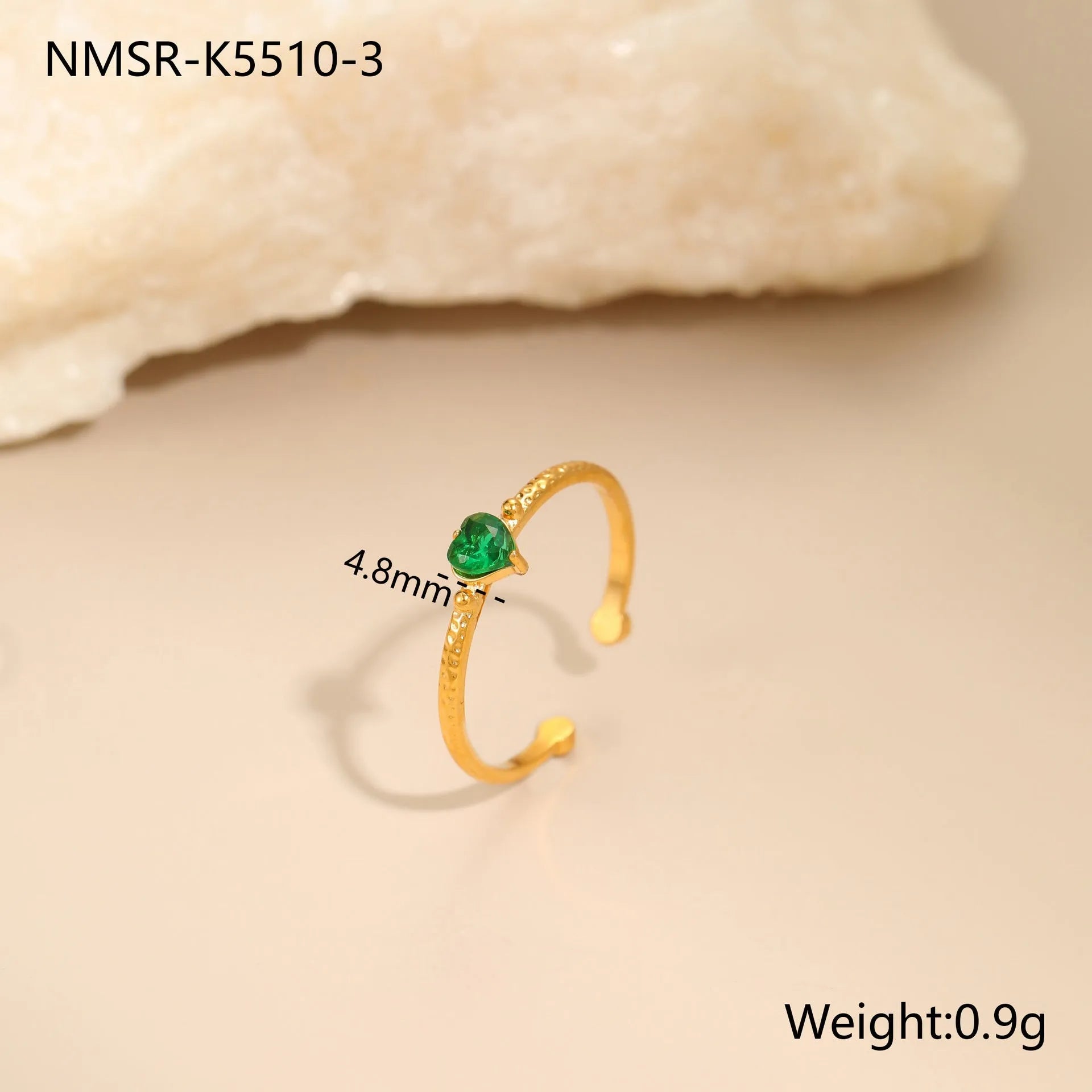 Open ended stainless steel ring with a geometric zirconium love heart inlay in green, pink, or white.