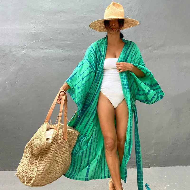 Printed cotton beach cover-up blouse in one size loose fit for sun protection.