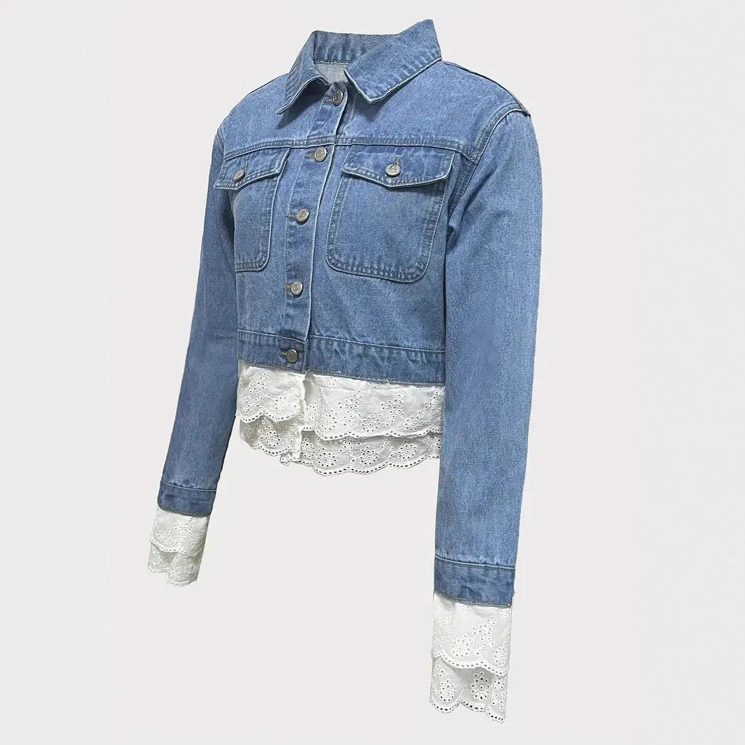Blue women's denim jacket with lace stitching detail on the front, with long sleeves.