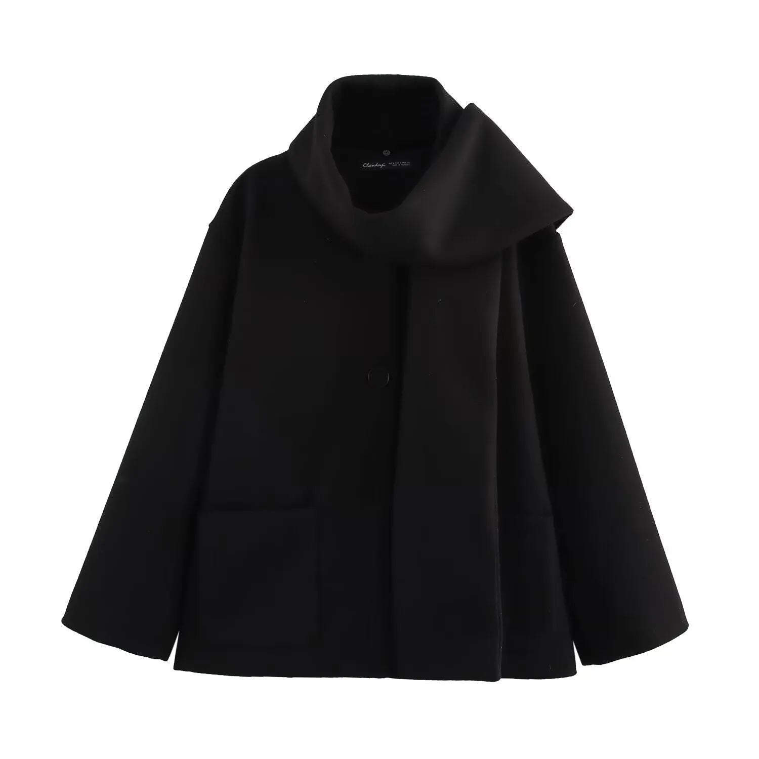 Women's long black overcoat with grey artificial fur collar, showing longline silhouette and pocket detail.