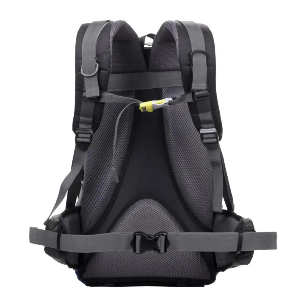 Green polyester outdoor backpack with straps, shown with a capacity of 20-35 litres for sports and travel.