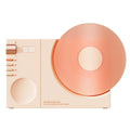 Mini Bluetooth speaker in obsidian black, ivory white, coral pink, and plum green colours