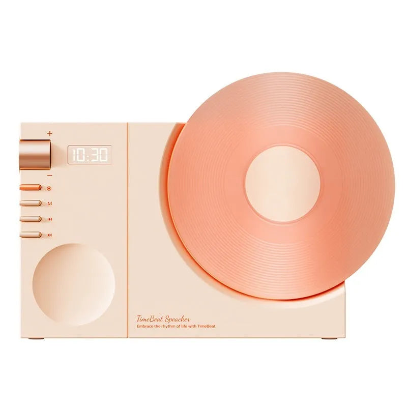 Mini Bluetooth speaker in obsidian black, ivory white, coral pink, and plum green colours