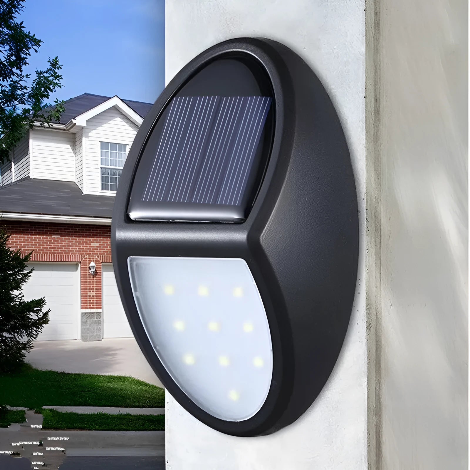 Black solar-powered LED wall light with automatic light sensor for outdoor garden use
