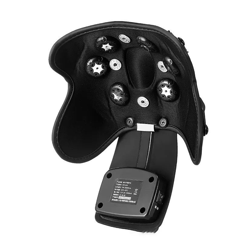 Infrared heat therapy knee and shoulder massager with pads and power adapter on a table.