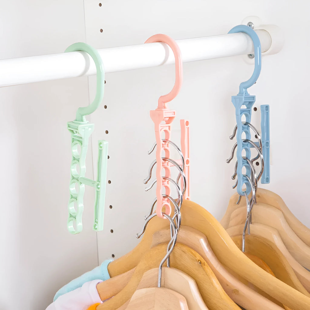 Blue revolving wardrobe hanger with five rotating branches and a top handle