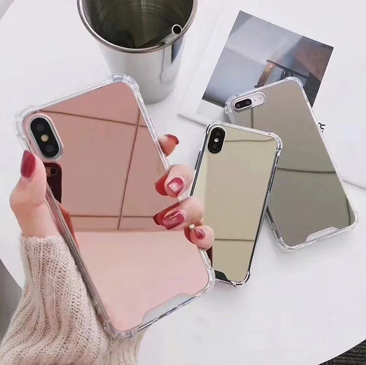 Mirror iPhone Case in various colours including black, blue, gold, rose gold, silver, and transparent.