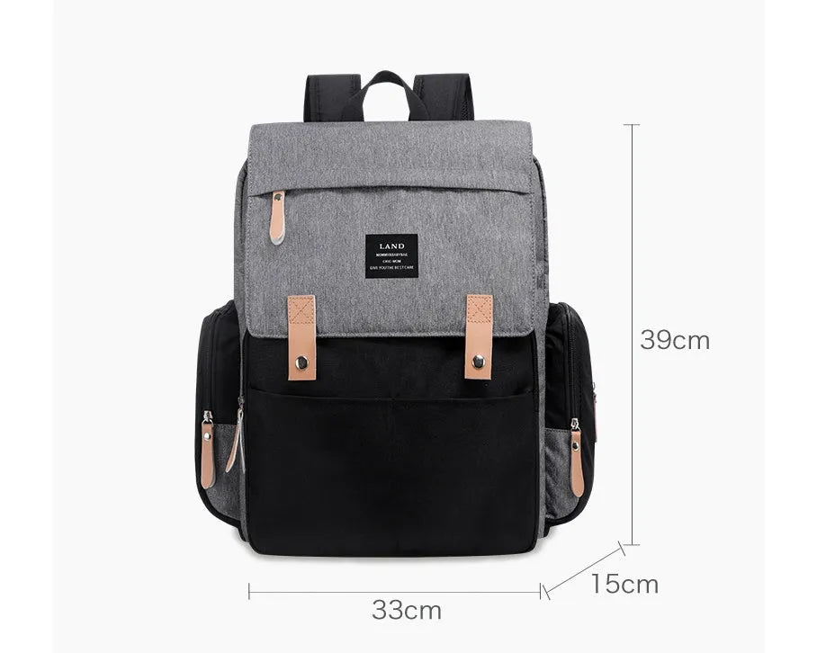 Land Mommy MPB86 grey diaper backpack with changing mat, showing main compartment and straps.