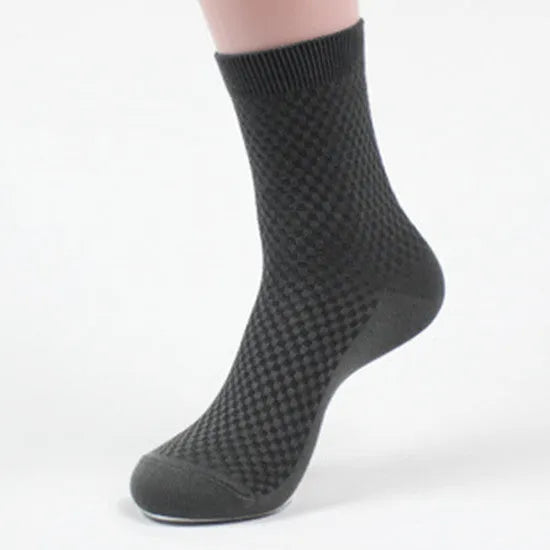 Men's bamboo fibre sock in small square pattern, shown in navy blue colour