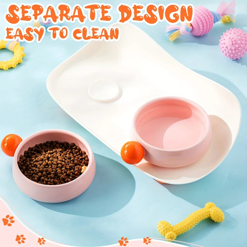 Elevated ceramic pet bowl set in pink with two bowls on a non-slip raised platform.