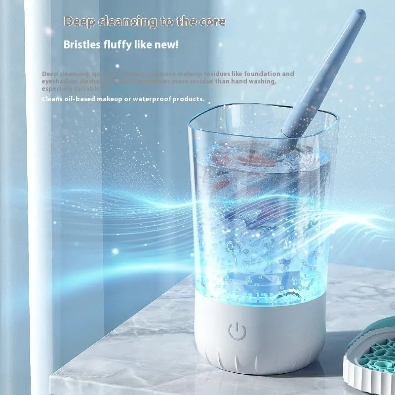 White plastic electric makeup brush cleaner with USB charging cable