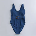 Navy blue women's one-piece slimming swimsuit with removable chest pads