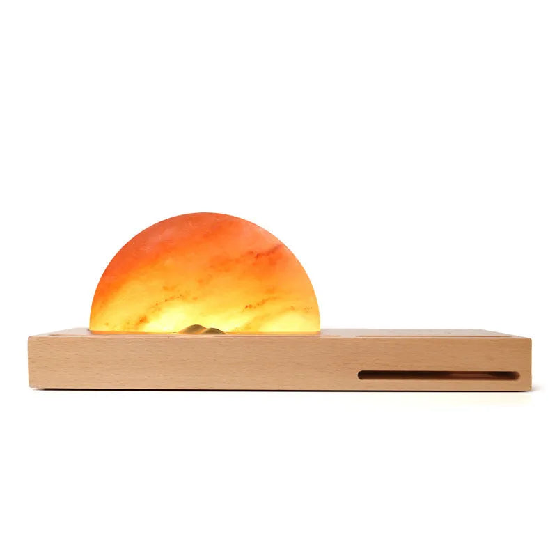 Sunrise Oriental wooden base table lamp with natural salt block shade and integrated wireless phone charging pad.