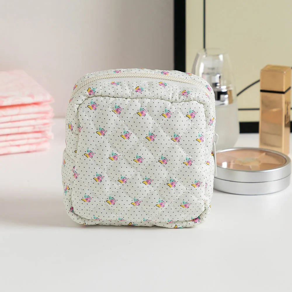 Polyester ladies key storage wallet with floral print and coin purse compartment.