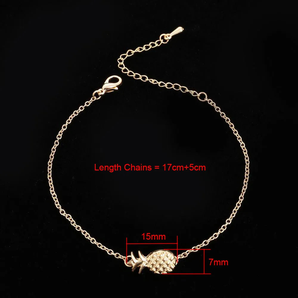 Women's alloy pineapple bracelet from XINGX series in gold or silver colour on wrist.