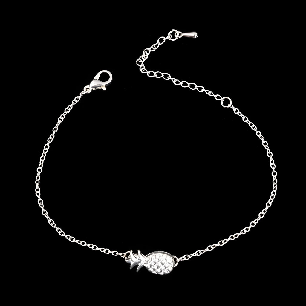 Women's alloy pineapple bracelet from XINGX series in gold or silver colour on wrist.