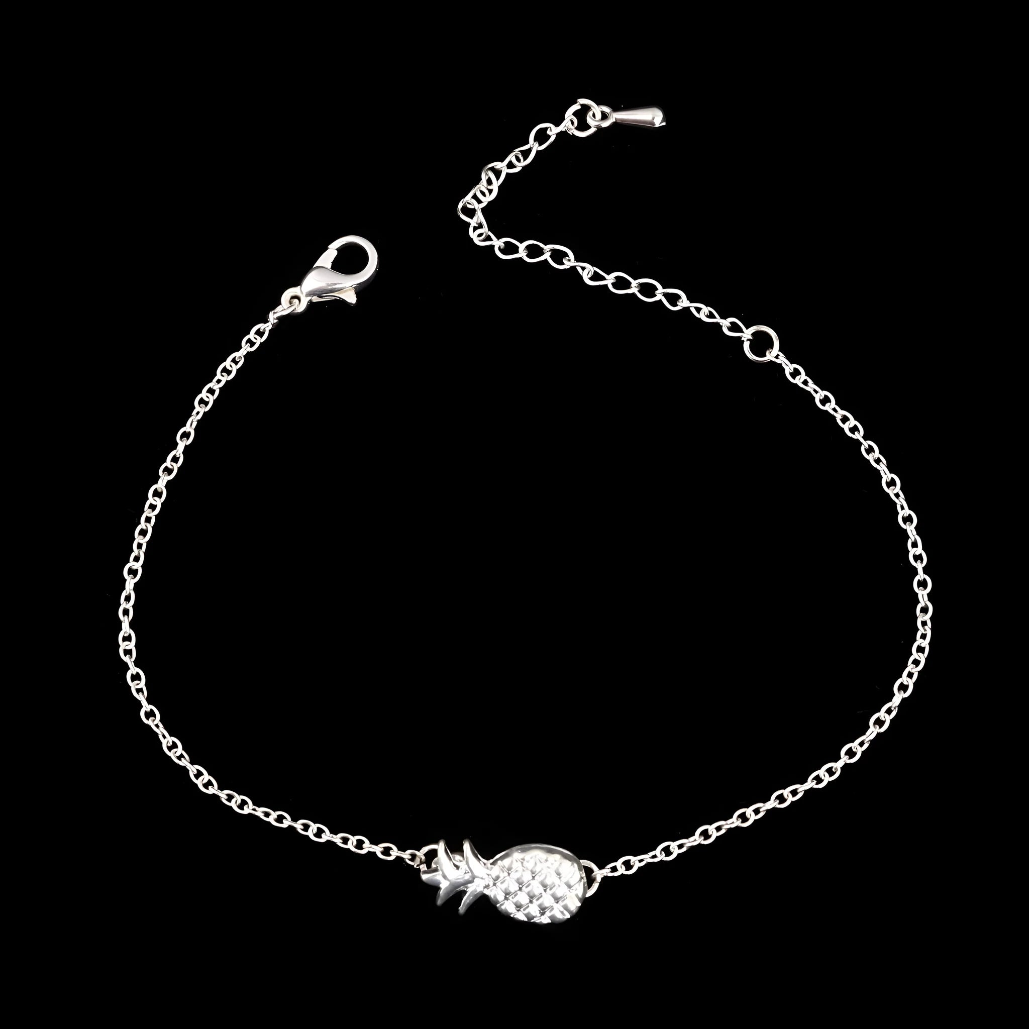 Women's alloy pineapple bracelet from XINGX series in gold or silver colour on wrist.