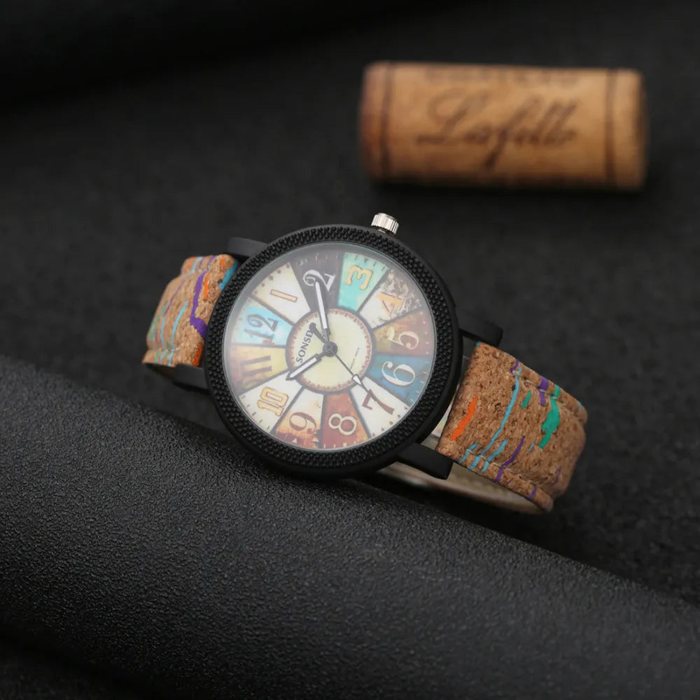 Women's vintage-style quartz watch with brown leather strap and silver round 37mm dial.