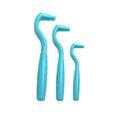 Set of three coloured plastic tick removal hooks for dogs on white background