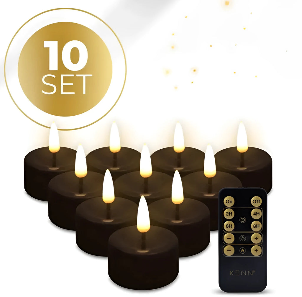 Four black LED tealight candles showing flickering flame effect