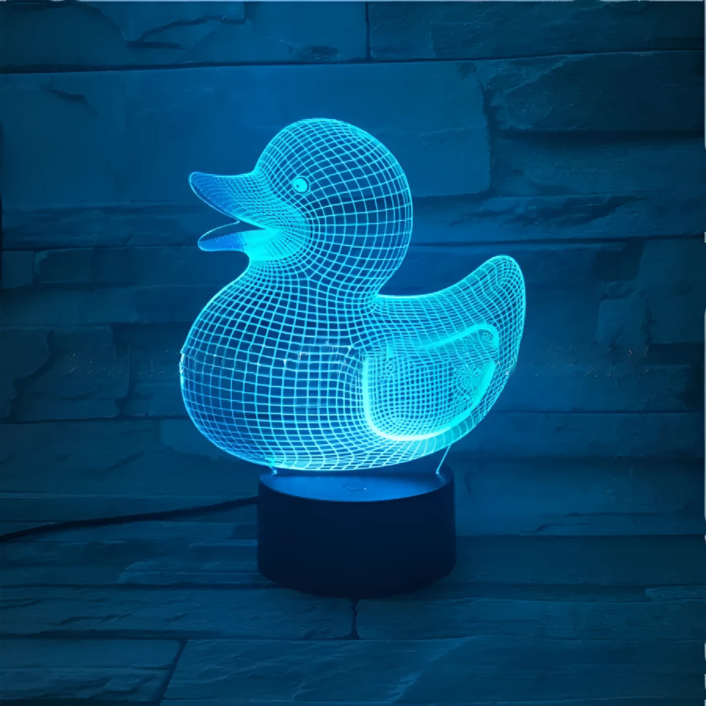 Little yellow duck 3D acrylic night light with ABS base showing seven colour LED options and remote control