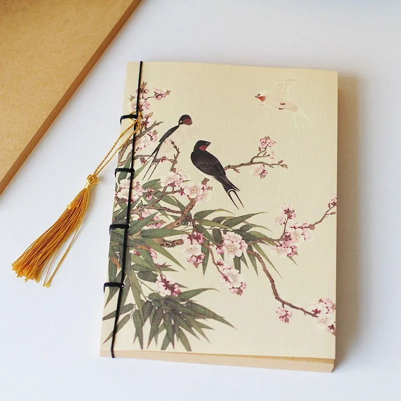 Antique wire-bound notebook with embossed cowhide cover and black wax rope binding