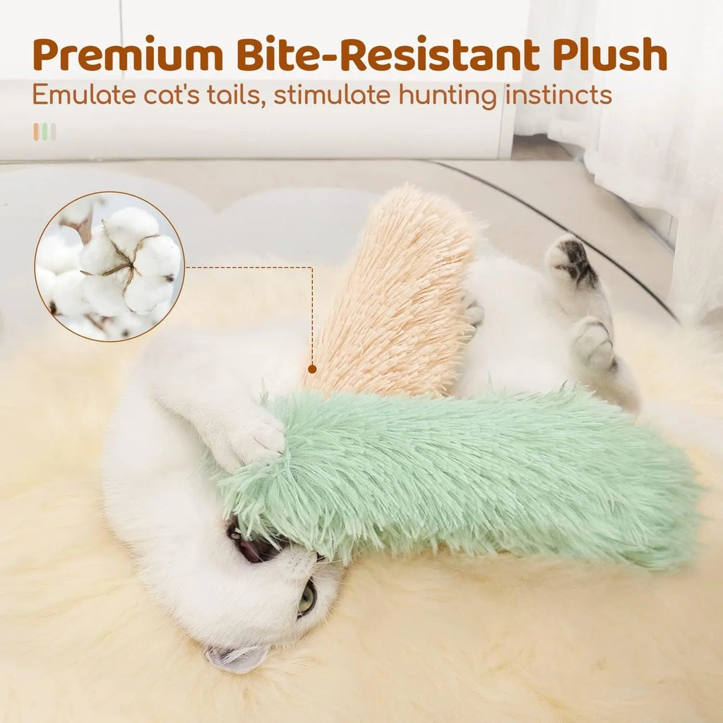 Plush cat toy pillow in blue, green, pink, or white colours, measuring 27cm by 10cm.