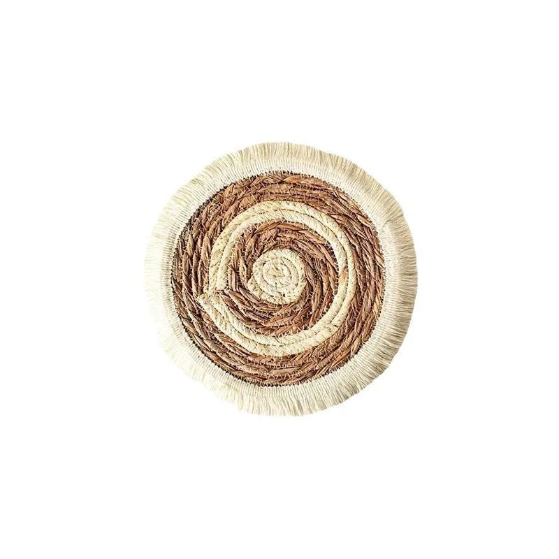 Round Japanese straw placemat with tassel detailing in papyrus material, available in four diameter sizes