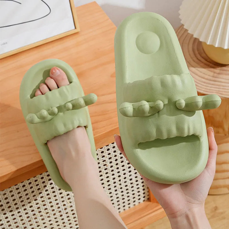 Deer horn design EVA flip flop slippers in light yellow, showing hollow out upper and textured sole.