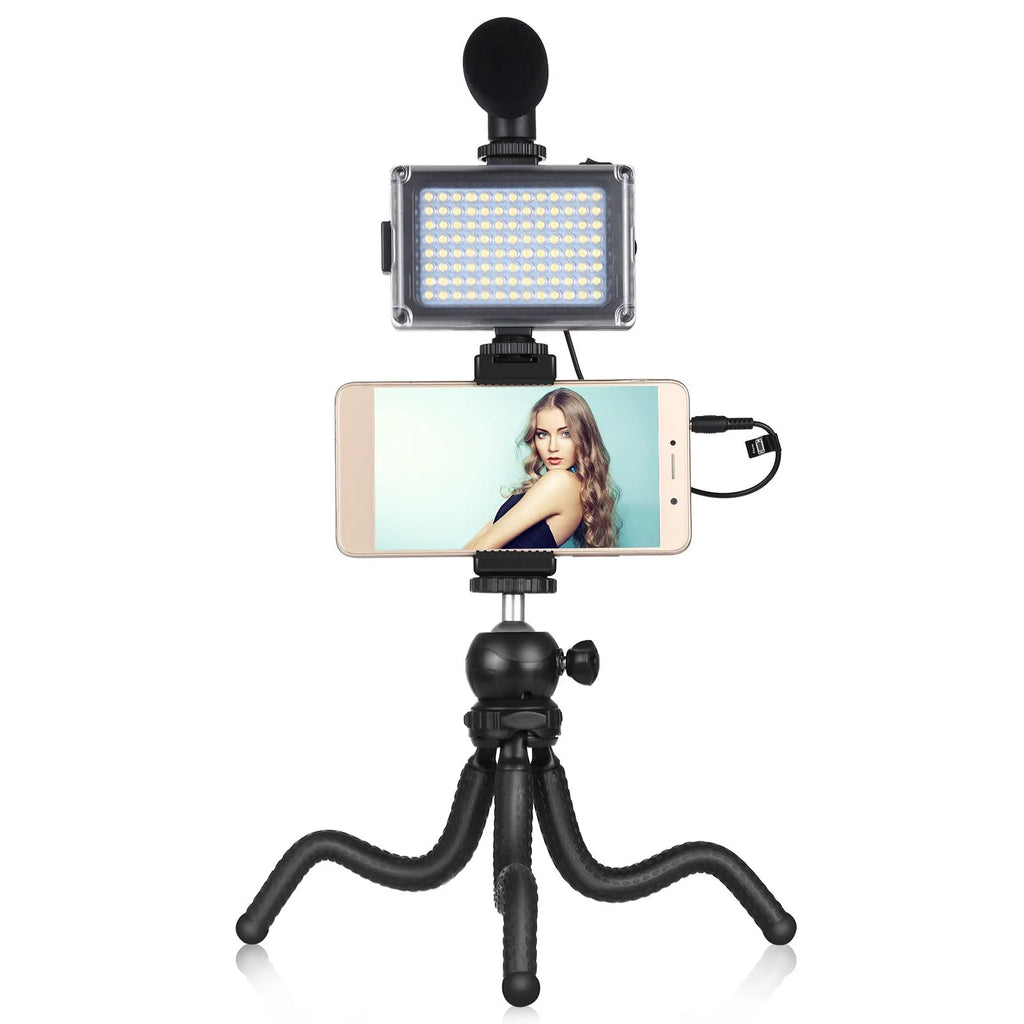 Black Octopus flexible tripod live broadcast kit with attached fill light and microphone on a table