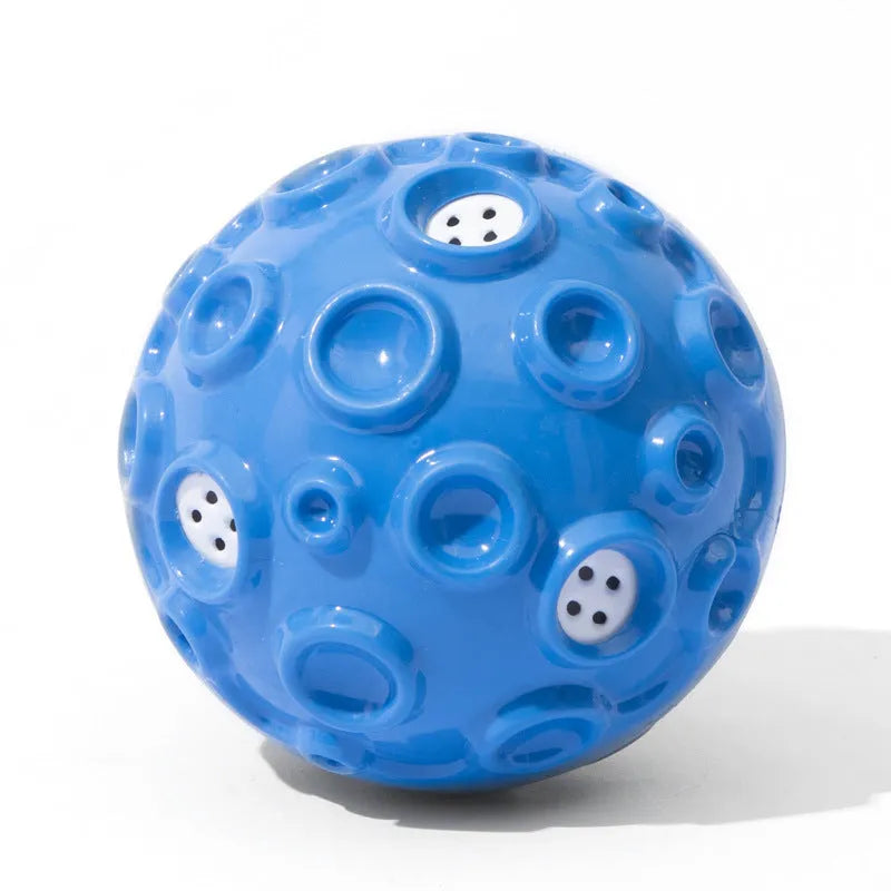 Colourful dog chew ball with textured surface and two-layer rubber construction for aggressive chewers