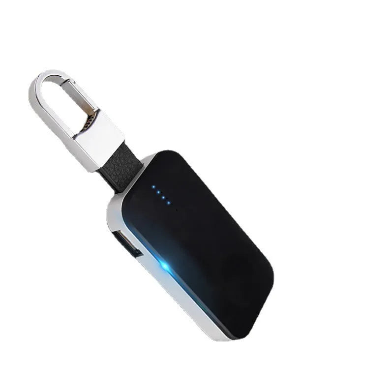 Black Apple Watch magnetic wireless charging power bank on a keyring, showing compact rectangular design.