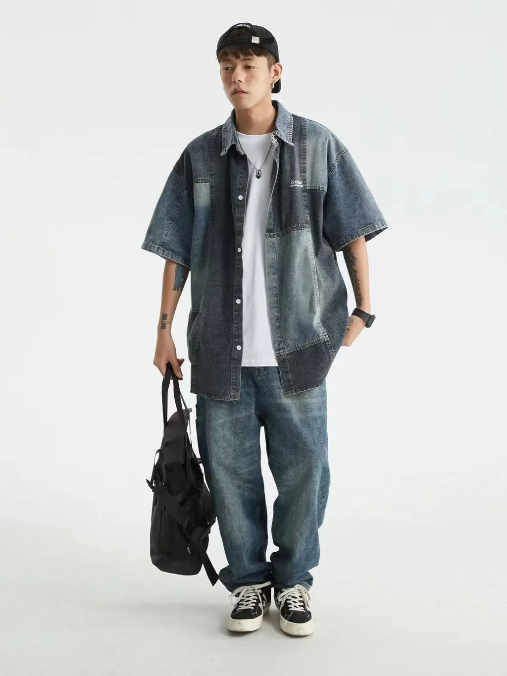 Blue Japanese-style denim shirt with washed stitching, loose fit, and cardigan style for men