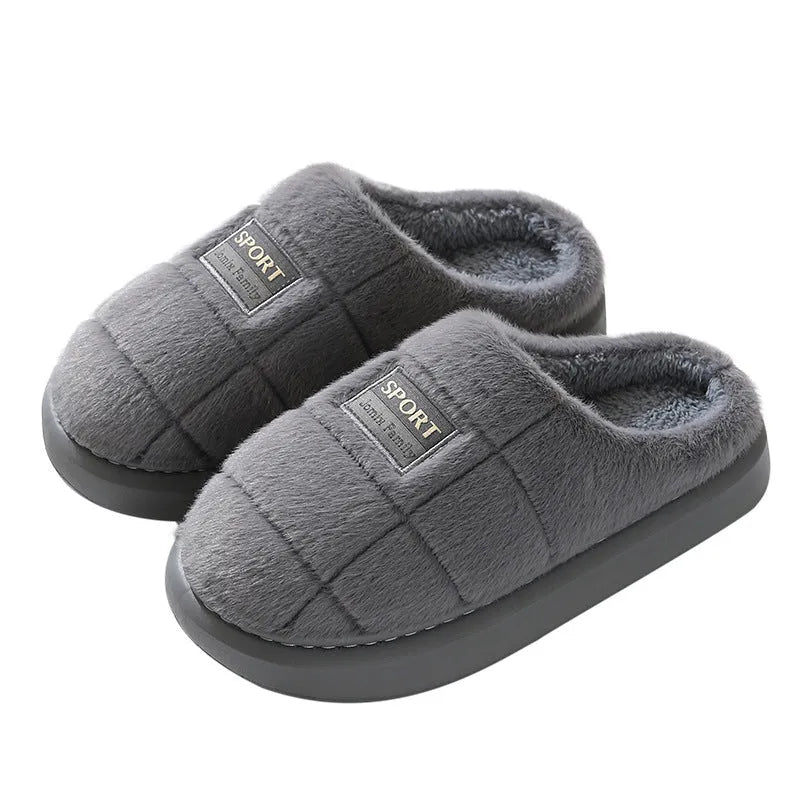 Men's grey plaid slippers with rabbit hair upper and EVA sole, showing toe holder design
